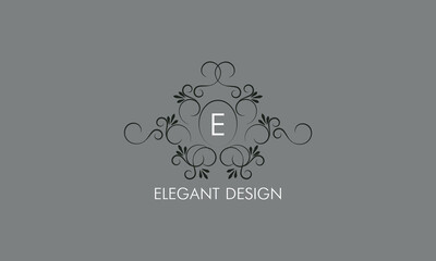 Wall Mural - Sophisticated monogram design with calligraphic elegant line art logo design. Letter E. Business sign for royalty, boutique, cafe, hotel, restaurant, jewelry.