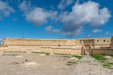 Fototapeta Uliczki - A glimpse of the imposing St. Elmo Fort, Valletta, Malta