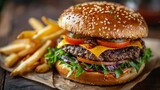 Fototapeta Sport - Delicious Cheeseburger and Fries on Wooden Board