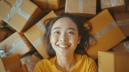 Aufkleber - A woman laying on top of a pile of boxes. Suitable for logistics or moving concept
