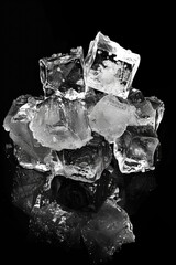 Poster - A pile of ice cubes on a table, perfect for refreshing drink concepts