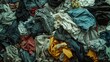 A pile of clothes on a wooden floor, suitable for various concepts