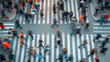 Aerial view of a crossroads with people crossing it, blur effect