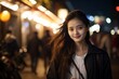 Portrait of beautiful young Asian female on the city street in Tokyo