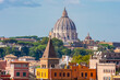 St. Peter's basilica in Vatican seen from Orange garden of Aventine hill, Rome, Italy