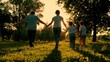 Family Dad, mother, child, son run together. Happy family, holding hands, runs towards sun, has fun in city park, sunset. Slow motion. Family holiday concept. Happy childhood, freedom people play