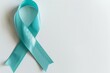 A ribbon with a blue ribbon is on white background