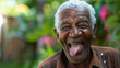 happy old black grandpa sticking tongue out