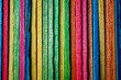 multi colored wooden craft sticks, colorful background