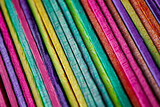 Fototapeta Dmuchawce - multi colored wooden craft sticks, colorful background
