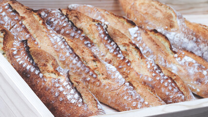 Poster - Fresh fragrant bread on the table. Food concept