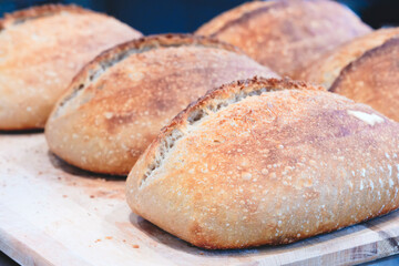 Poster - Fresh fragrant bread on the table. Food concept