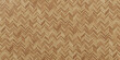 Seamless wood parquet texture herringbone light brown. 
