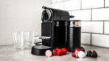 Fototapeta Do akwarium - Capsule coffee machine at domestic kitchen