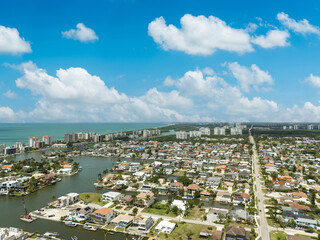 Wall Mural - Aerial sky view of Vanderbilt Beach and the ocean on a sunny day