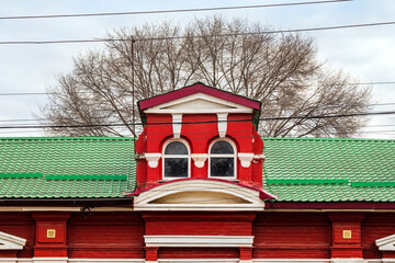 Wall Mural - A face with eyes in the shape of the architecture of a building. Pareidolia is a type of apophenia. Interesting architectural features and details