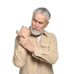 Wall Mural - Arthritis symptoms. Man suffering from pain in wrist on white background