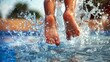 Close up view of a childs feet splashing and playing in the water