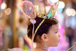 child wearing a princess crown and wand from a display