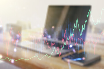Poster - Double exposure of abstract creative financial chart and modern desktop with laptop on background, research and strategy concept