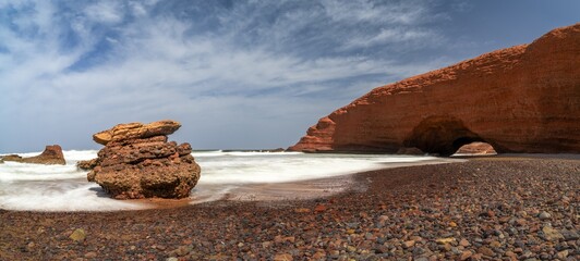 Wall Mural - panorama landscape view of the beach and rock arch at Legzira on the Atlantic Coast of Morocco