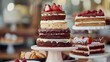A tiered cake stand displaying a variety of flavors and textures, including a rich chocolate cake, a light and airy vanilla cake, and a fruity strawberry cake