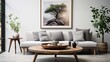 A living room with a large tree in a picture on the wall. The room is decorated with white furniture and has a modern feel