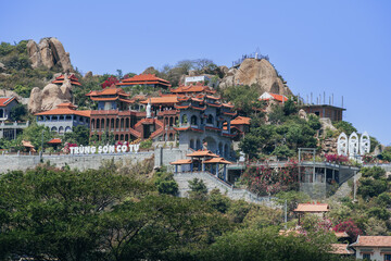 Wall Mural - View of biggest pagoda in Ninh Thuan province, Vietnam. Text in photo mean name of this pagoda Trung Son Co Tu.