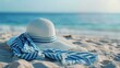 Blue and white beach hat with scarf on the sand in the style of sea on a sunny day