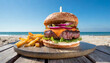 Wagyu Burger with fries on wooden at beach, concept of holiday, travel and leisure