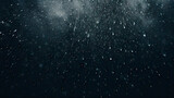 Fototapeta  - snowflakes falling against black backdrop