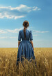Beauty historical Early american pioneer brunette woman with braids and blue dress outdoors. Back view. Old west, Victorian, Georgian, Edwardian. Historical romance style. Wheat field, blue sky. 