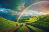 Fototapeta Tęcza - Rainbow Shining in the Sky over Green Valley