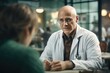 © Andrii  - Confident Middle-aged Physician Counseling Patient and Family