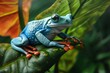 a blue frog on a leaf