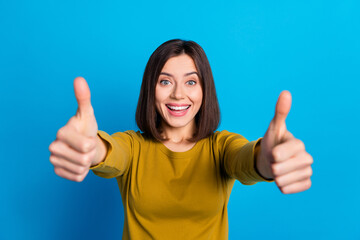 Poster - Photo of adorable confident lady dressed shirt showing two thumbs up isolated blue color background