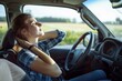 woman taking a break from driving, stretching her neck