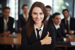 Portrait of a smiling businesswoman. Businesswoman in a black suit in an office environment. She is smiling and making thumb up hand gesture with shis finger. Generative AI