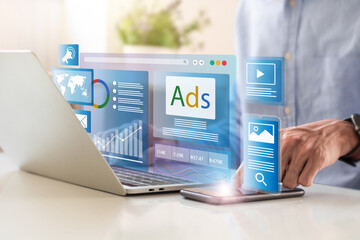 Digital marketing concept, Businessman using laptop with Ads dashboard digital marketing strategy analysis for branding. online advertisement, ad on website and social media. SEO. SMM.