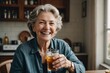 Beautiful older woman portrait leaning on soda at home laughing