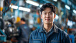 portrait of a technician young man in a car factory