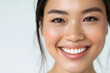 © Oksana - Closeup Beautiful smiling asian young woman with smooth healthy skin isolated on white background