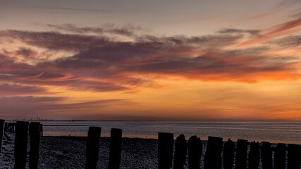 Wall Mural - Stunning view of Lepe Beach during a breathtaking sunset
