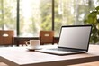 © Оксана Олейник - Modern laptop open on a wooden desk beside a white coffee cup, remote work setting.