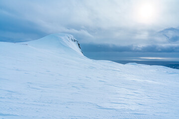 Wall Mural - Iceberg glacier mountain with snow covered on summit in winter