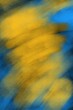 Abstract blue and yellow brush strokes, drops, splashes of paint