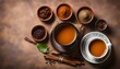 Top view of Indian Masala Chai or traditional beverage with tea, milk and spices Kerala India