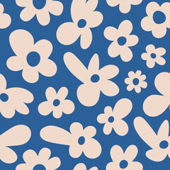 Poster - Seamless pattern with beige groovy daisy flowers on a blue background.  Vector illustration
