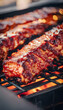 Juicy barbecued ribs on a grill with flames, close-up, with a warm, smoky ambiance.