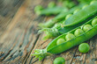Fresh peas on wooden table
